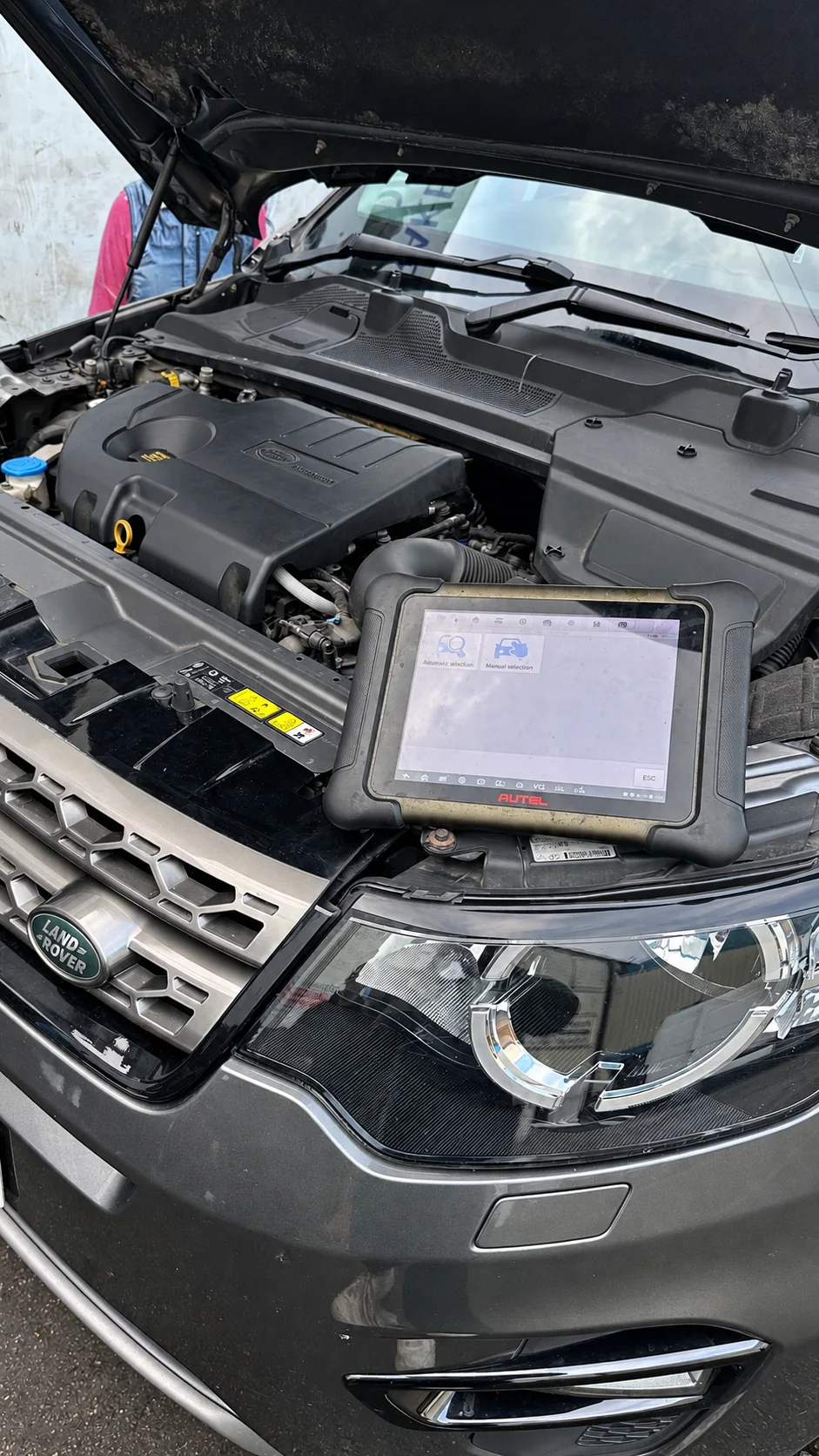 Diagnostic tablet connected to a vehicle at Norwich Garage